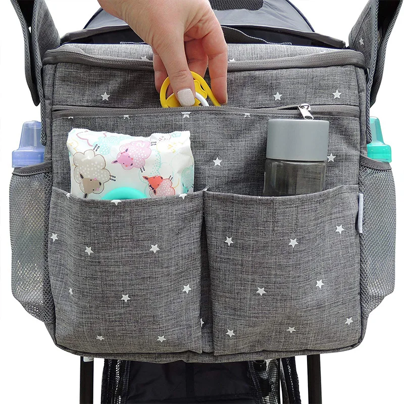 Mummy Bag Multi-functional Large Capacity Portable Velcro Hanging Stroller Printed Diaper Bag Baby Necessities
Mummy Bag Multi-functional Large Capacity Portable Velcro Hanging Stroller Printed Diaper Bag Baby Necessities