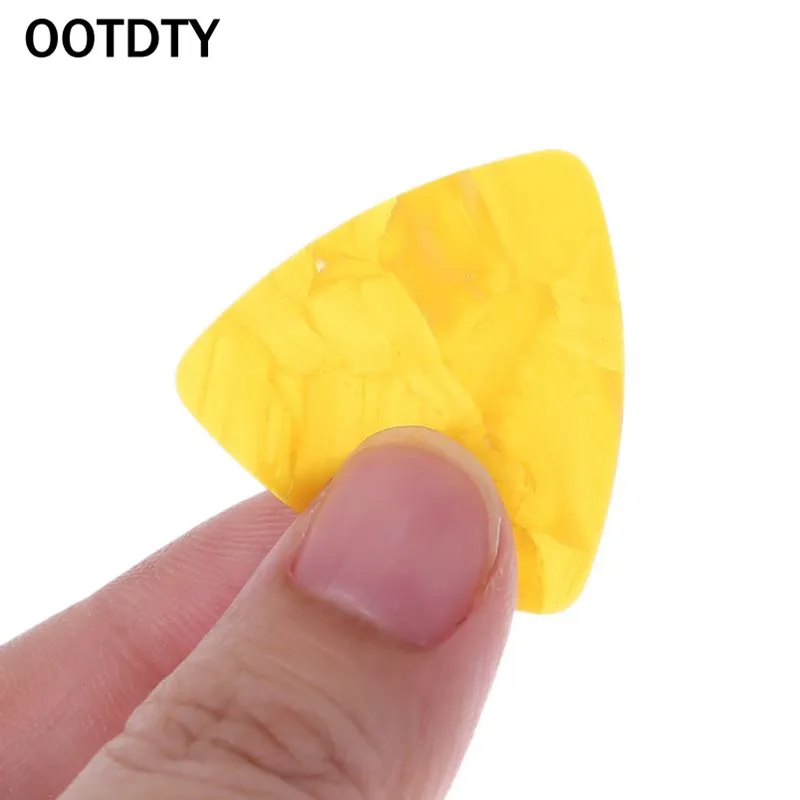 OOTDTY uitar Pick Plectrum 100pcs Triangle Celluloid Instruments 0.46mm Random Color
OOTDTY uitar Pick Plectrum 100pcs Triangle Celluloid Instruments 0.46mm Random Color
