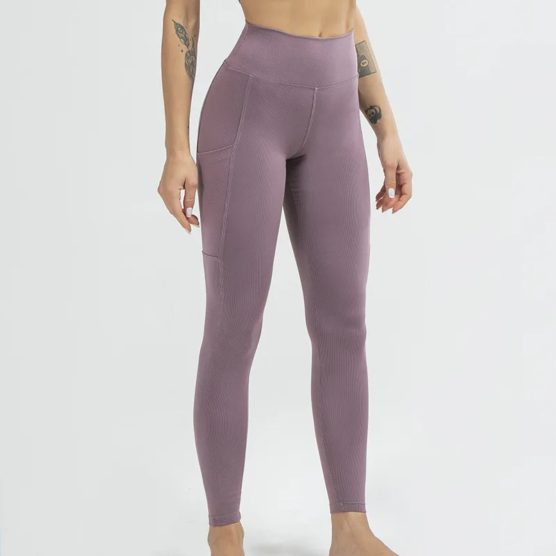 Peach Hip Lifting Tights Pants High Waist Screw Thread Vertical Bar Texture Running Fitness Yoga Pockets Girl Push Up Legging
Peach Hip Lifting Tights Pants High Waist Screw Thread Vertical Bar Texture Running Fitness Yoga Pockets Girl Push Up Legging