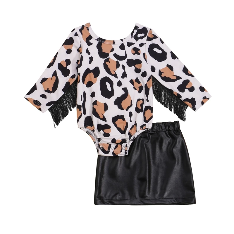 Модная повседневная одежда для девочек, комплект из двух предметов, черная Однотонная юбка и комбинезон с леопардовым принтом и кисточками
Модная повседневная одежда для девочек, комплект из двух предметов, черная Однотонная юбка и комбинезон с леопардовым принтом и кисточками