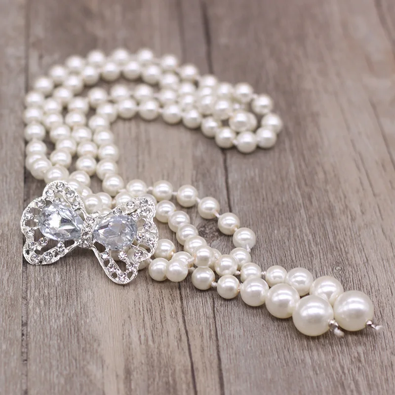 European and American fashion wedding dress accessories dress with a thin belt set diamond pearl waist ornaments
European and American fashion wedding dress accessories dress with a thin belt set diamond pearl waist ornaments