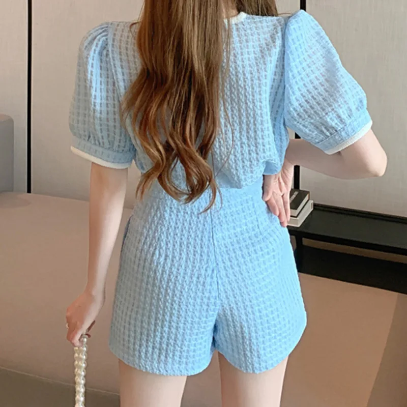 2021 Summer Fashion Shorts Sets Puff Sleeve Single Breasted Crop Top + High Waist Wide Leg Shorts 2 Piece Sets Womens Outfits
2021 Summer Fashion Shorts Sets Puff Sleeve Single Breasted Crop Top + High Waist Wide Leg Shorts 2 Piece Sets Womens Outfits