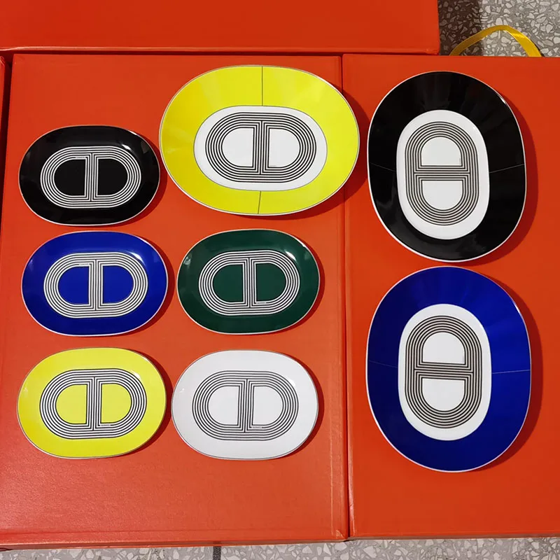 Prato de cerâmica estilo ocidental, conjunto de louça em formato oval para moda de passarela
Prato de cerâmica estilo ocidental, conjunto de louça em formato oval para moda de passarela