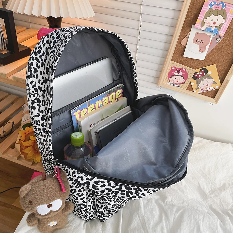 New Leopard Print Women Backpack Female Waterproof Polyester Cotton Composite Travel Bag Lucent Heart Schoolbag for Girls
New Leopard Print Women Backpack Female Waterproof Polyester Cotton Composite Travel Bag Lucent Heart Schoolbag for Girls