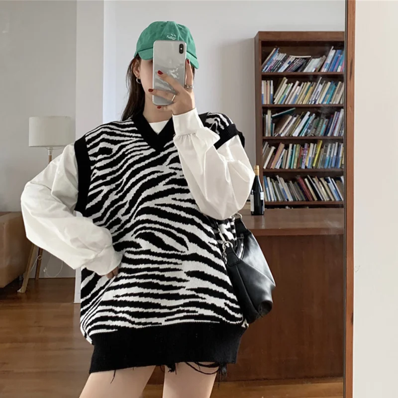 Женский трикотажный жилет с V-образным вырезом, свободного покроя
Женский трикотажный жилет с V-образным вырезом, свободного покроя