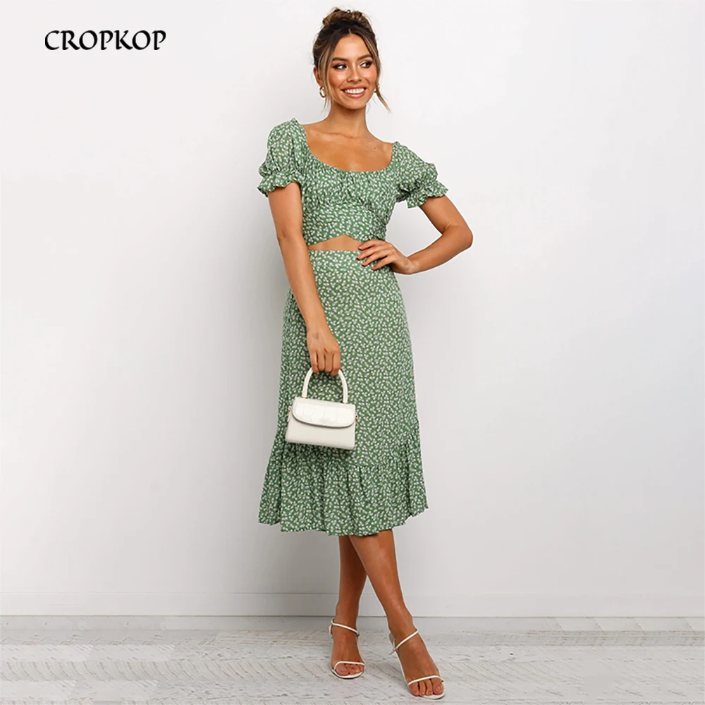 Летний комплект костюм женский юбка, сексуальн бандажное кроп топ с коротким рукавом, длинная юбка с рюшами и цветочный принт, повседневный ... 
Летний комплект костюм женский юбка, сексуальн бандажное кроп топ с коротким рукавом, длинная юбка с рюшами и цветочный принт, повседневный ...