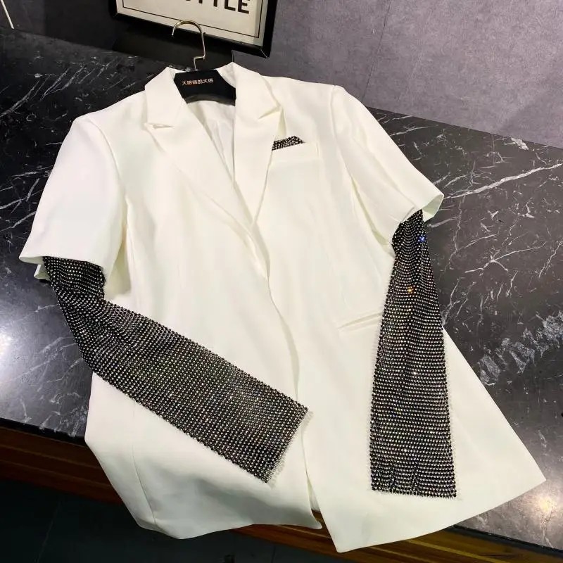 New celebrity in the spring of 2020 diamond hollow sleeve bag shiny long sleeved suit blazer jacket female
New celebrity in the spring of 2020 diamond hollow sleeve bag shiny long sleeved suit blazer jacket female