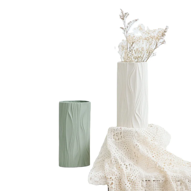Nordic modern ceramic vase decoration simple wavy line flower furniture crafts customization
Nordic modern ceramic vase decoration simple wavy line flower furniture crafts customization