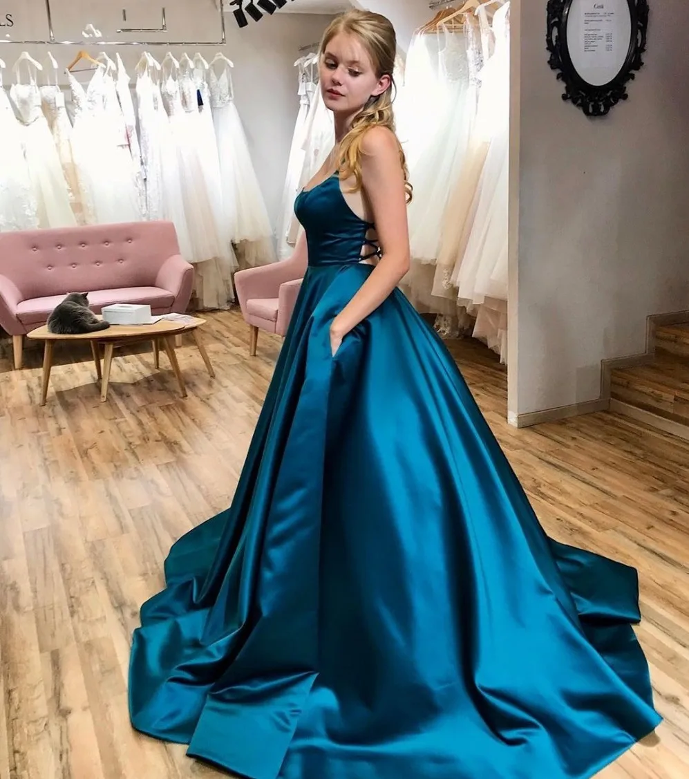 Custom Made Simple Elegant Long Formal Evening Gowns 2020 Straps Back Sexy Prom Dress with Pockets Teal Satin robe de soriee
Custom Made Simple Elegant Long Formal Evening Gowns 2020 Straps Back Sexy Prom Dress with Pockets Teal Satin robe de soriee