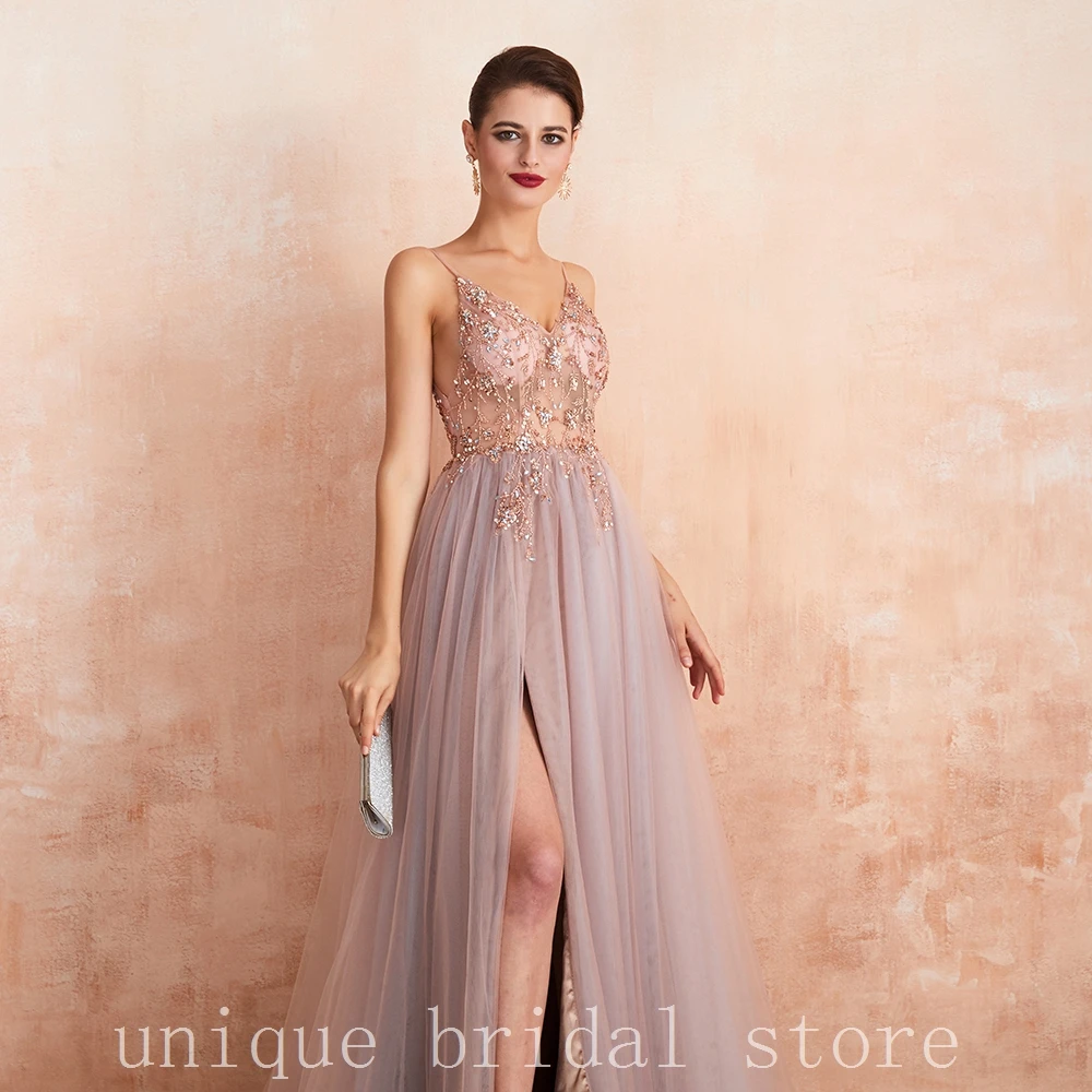 Evening Dresses de sexy backless Sheer gasa de V-Neck de Beading cristal Paillette Formal Prom Gowns with Slit robe de soiree21
Evening Dresses de sexy backless Sheer gasa de V-Neck de Beading cristal Paillette Formal Prom Gowns with Slit robe de soiree21