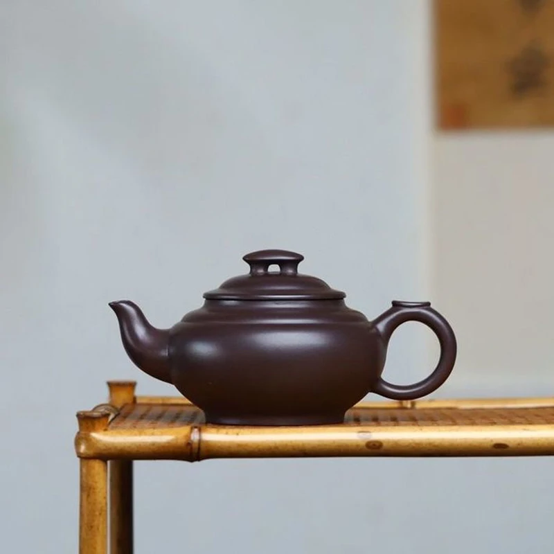 Chinese teapot Yixing purple clay teapot, raw ore purple clay Shangxinqiao teapot Kungfu tea set teapot capacity 220ml
Chinese teapot Yixing purple clay teapot, raw ore purple clay Shangxinqiao teapot Kungfu tea set teapot capacity 220ml