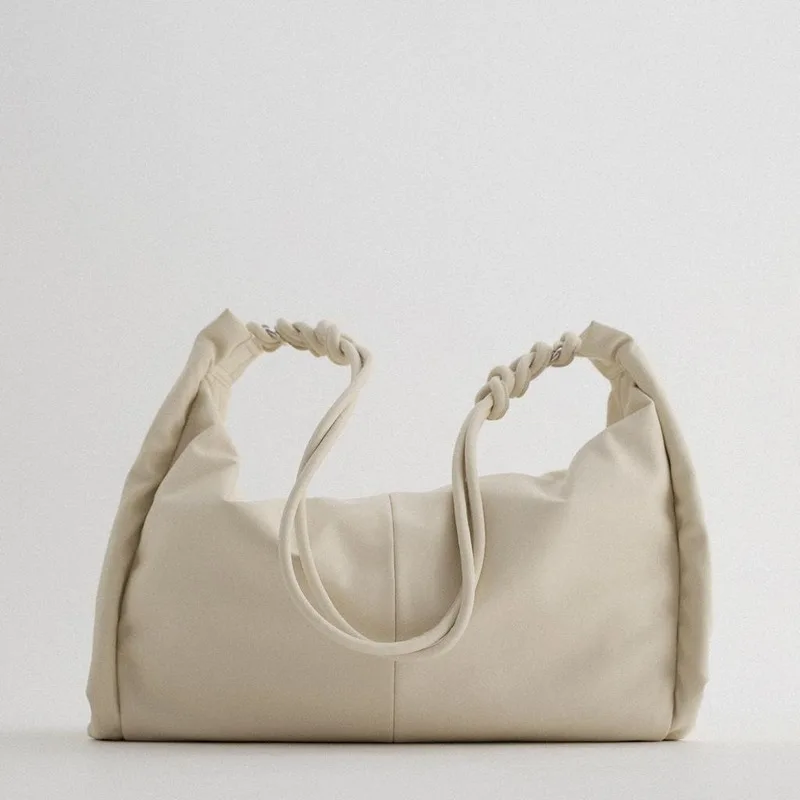 New Women's Simple and Versatile Light Beige Side Pleated Decorative Shoulder Shopping Bag Tote Bag
New Women's Simple and Versatile Light Beige Side Pleated Decorative Shoulder Shopping Bag Tote Bag