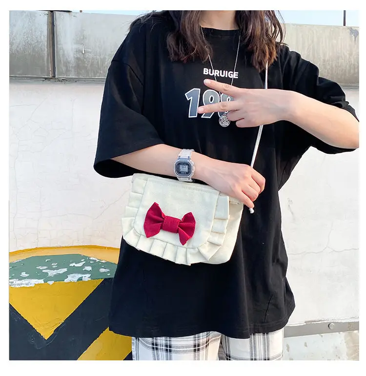 Canvas Ladies Handbags Bow Women Shoulder Bags Fashion Designer Crossbody Bags for Women Messenger Bags Solid Color Girls Bags 
Canvas Ladies Handbags Bow Women Shoulder Bags Fashion Designer Crossbody Bags for Women Messenger Bags Solid Color Girls Bags