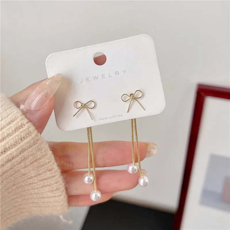 Bowknot tassel earrings pendant two wear light earrings net red face thin Korean earrings
Bowknot tassel earrings pendant two wear light earrings net red face thin Korean earrings