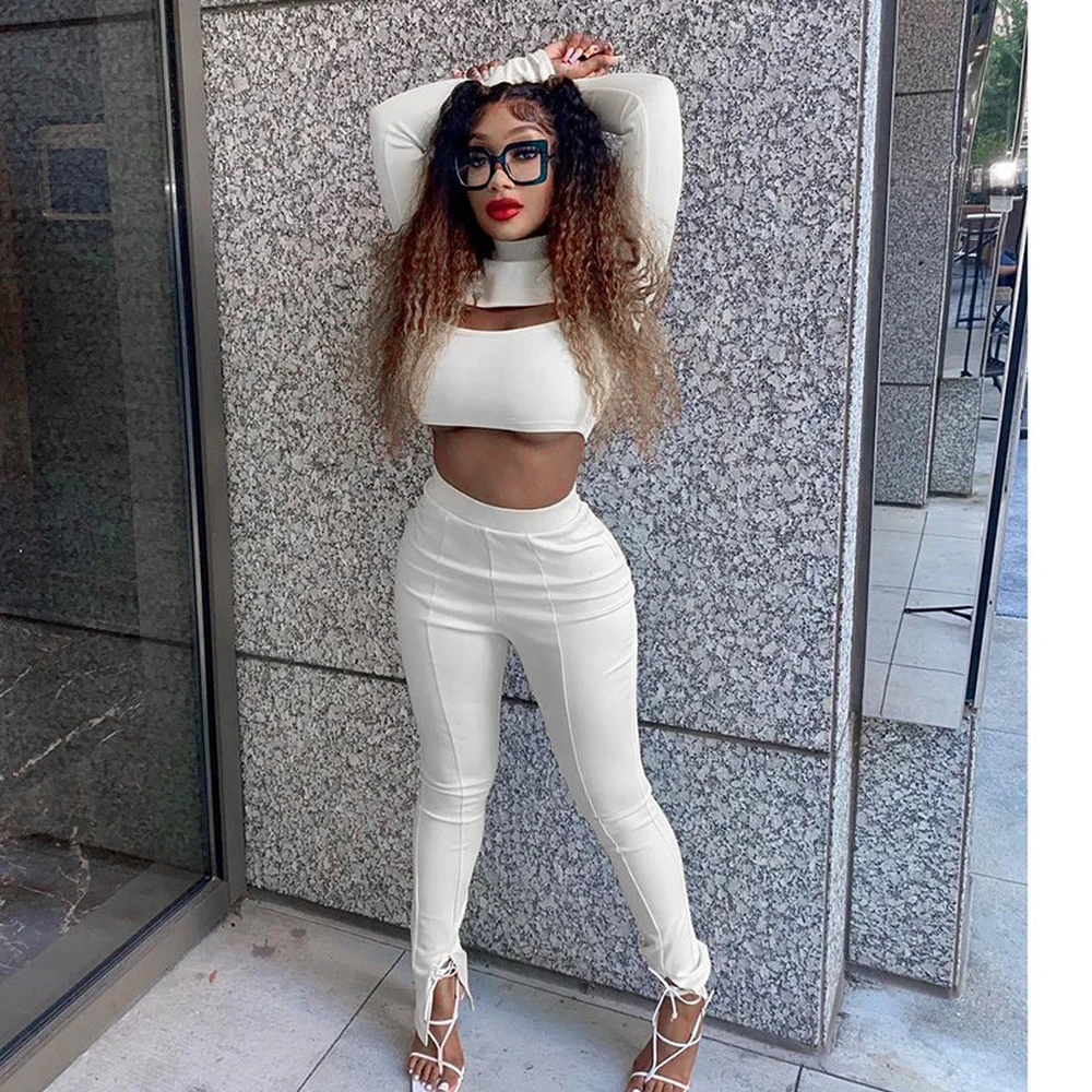 Sense of Design Solid Hollow Front Long Sleeve Stand Collar Crop Top and Split Hem Fitness Legging Sweatsuit Two Piece Outfits
Sense of Design Solid Hollow Front Long Sleeve Stand Collar Crop Top and Split Hem Fitness Legging Sweatsuit Two Piece Outfits