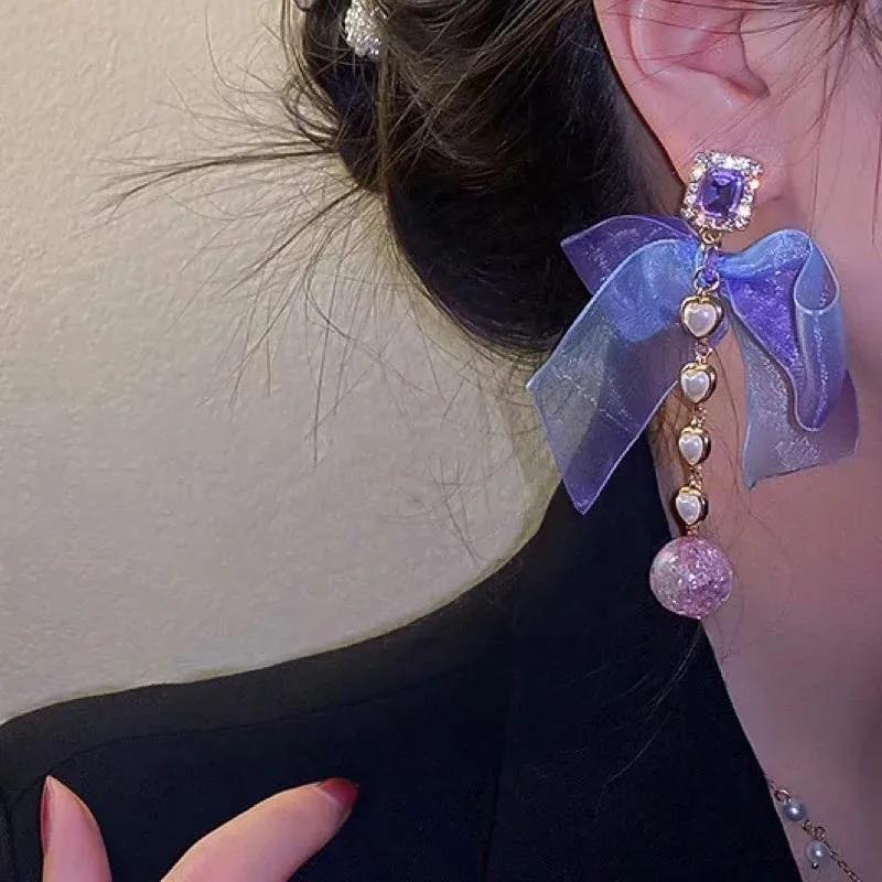 2021 New Trendy Jewelry Ladies Purple Bowknot Earrings Women's Long Tassel Earrings with Crystal Ball Pendant 
2021 New Trendy Jewelry Ladies Purple Bowknot Earrings Women's Long Tassel Earrings with Crystal Ball Pendant
