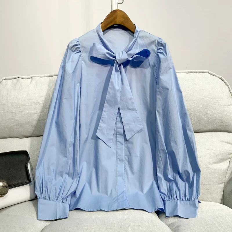 Женская хлопковая рубашка с бантом на воротнике, голубая Повседневная рубашка с рукавами-фонариками в европейском стиле, топы, 2021
Женская хлопковая рубашка с бантом на воротнике, голубая Повседневная рубашка с рукавами-фонариками в европейском стиле, топы, 2021