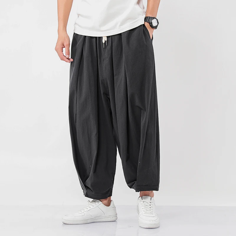 Chinese Style Men's Wide Wide Trousers Elastic Casual Harem Pants 2020 Spring Solid Color Oversize Man Pants Plus Size 5XL 
Chinese Style Men's Wide Wide Trousers Elastic Casual Harem Pants 2020 Spring Solid Color Oversize Man Pants Plus Size 5XL