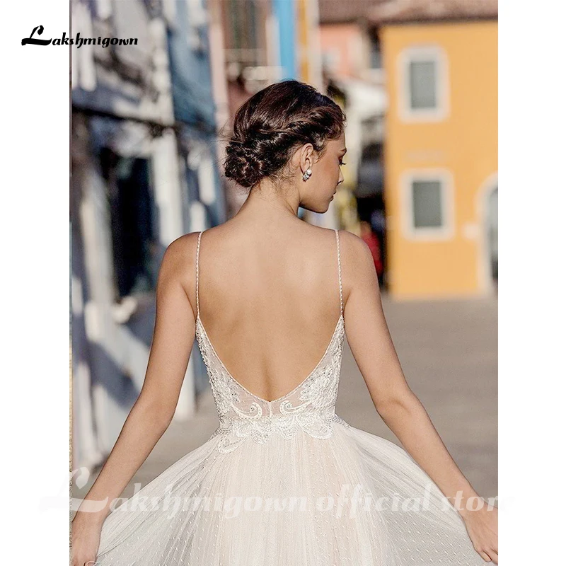 Lakshmigown Spaghetti Straps Garden Beach Wedding Dresses Sleeveless Robe De Soiree Backless Long Boho Brdial Gown elbise
Lakshmigown Spaghetti Straps Garden Beach Wedding Dresses Sleeveless Robe De Soiree Backless Long Boho Brdial Gown elbise