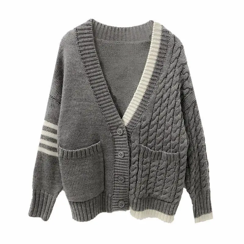 Autumn and winter clothes new knitted cardigan coat women Korean loose students lazy wind joker v-neck cardigan sweater women
Autumn and winter clothes new knitted cardigan coat women Korean loose students lazy wind joker v-neck cardigan sweater women