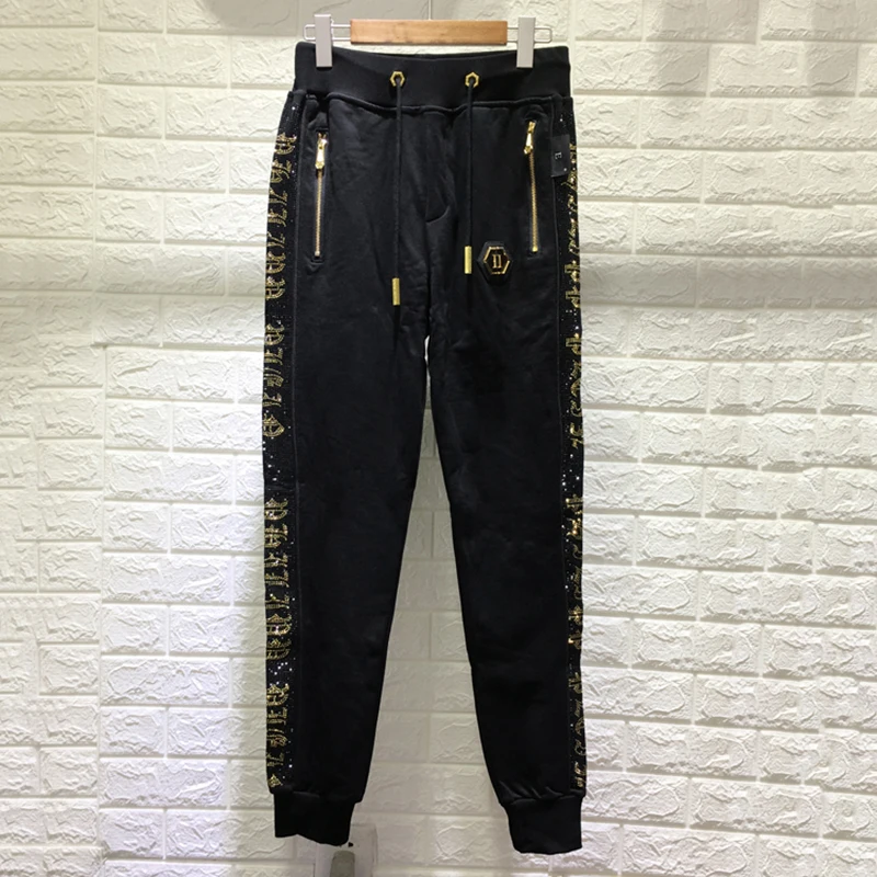 Men's trousers men's side letters hot drilling long trousers pp sports pants small feet fashion self-cultivation plein trousers
Men's trousers men's side letters hot drilling long trousers pp sports pants small feet fashion self-cultivation plein trousers