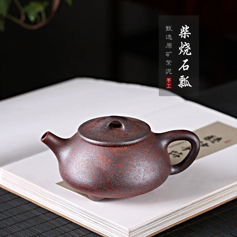 Yixing new purple clay pot raw ore Purple mud firewood burning pure handmade pot stone ladle tea set gift box
Yixing new purple clay pot raw ore Purple mud firewood burning pure handmade pot stone ladle tea set gift box
