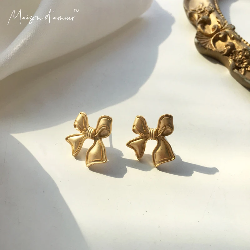 Korean Fashion New Vintage Matte Finish Gold Plating Alloy Sterling Silver 925 Bowknot Stud Women Earrings
Korean Fashion New Vintage Matte Finish Gold Plating Alloy Sterling Silver 925 Bowknot Stud Women Earrings