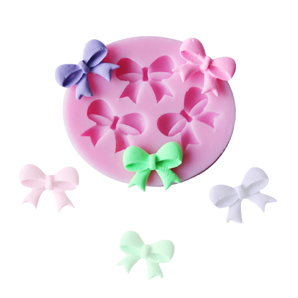 1pc Cute Bowknot Shape Silicone Mould Cake Fondant Decorating Tool Silicone Mold Bakeware Set Sugar Candy Soap Mold
1pc Cute Bowknot Shape Silicone Mould Cake Fondant Decorating Tool Silicone Mold Bakeware Set Sugar Candy Soap Mold
