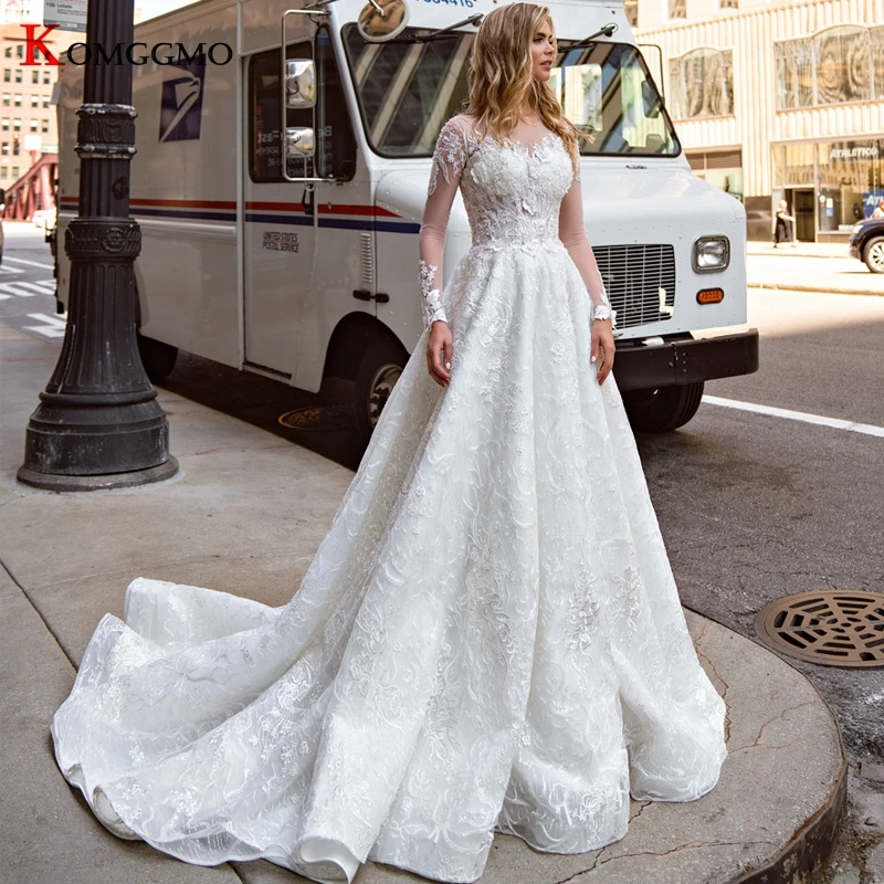 Full Sleeve Embroidery Appliques Tulle Chapel Train Bridal Ball Gown 2021 New Arrival O-Neck Button Back Wedding Dress for Women
Full Sleeve Embroidery Appliques Tulle Chapel Train Bridal Ball Gown 2021 New Arrival O-Neck Button Back Wedding Dress for Women