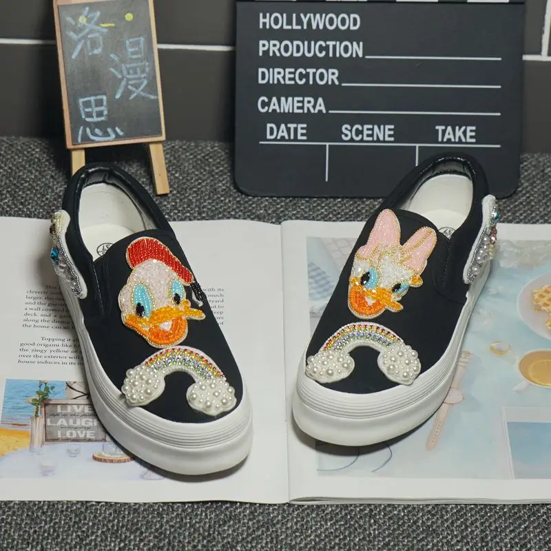 

Mandarin duck canvas shoes female 2021 summer new fashion brand heavy industry cartoon cute thick-soled lazy shoes casual