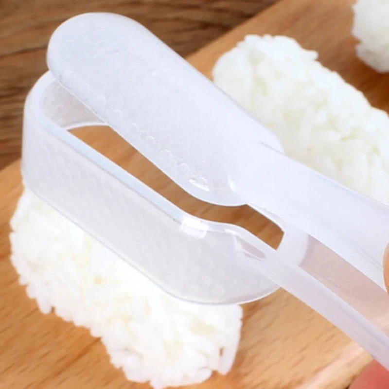 1pc Sushi Mold Onigiri Rice Ball Maker Warship Sushi Mold Bento Rice Ball Making Tools Easy Sushi Maker Kitchen Tools
1pc Sushi Mold Onigiri Rice Ball Maker Warship Sushi Mold Bento Rice Ball Making Tools Easy Sushi Maker Kitchen Tools