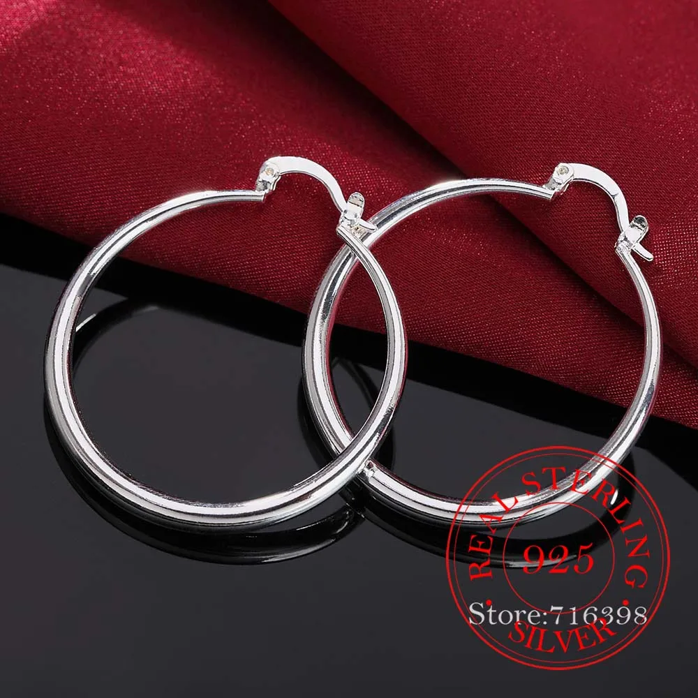 100% 925 Sterling Silver Hoop Earrings Korean Big Smooth Circle Vintage Party Earrings for Women Wedding Party Jewelry Gift 2020
100% 925 Sterling Silver Hoop Earrings Korean Big Smooth Circle Vintage Party Earrings for Women Wedding Party Jewelry Gift 2020