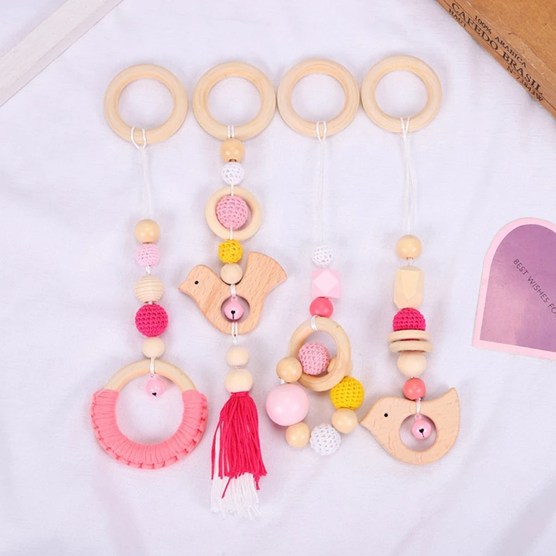 4 Pcs/Set Baby Gym Frame Stroller Hanging Pendants Wooden Ring Teether Molar Toy
4 Pcs/Set Baby Gym Frame Stroller Hanging Pendants Wooden Ring Teether Molar Toy