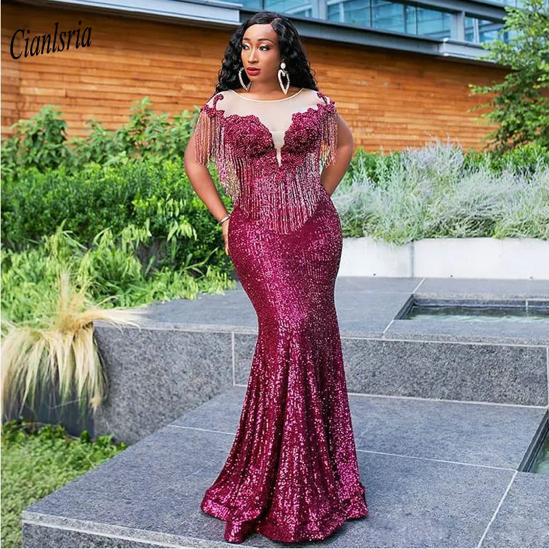 Burgundy Sequined Illusion African Nigerian Mermaid Evening Dress With Tassel Appliques Beading Cap Sleeve Evening Party Dresses
Burgundy Sequined Illusion African Nigerian Mermaid Evening Dress With Tassel Appliques Beading Cap Sleeve Evening Party Dresses