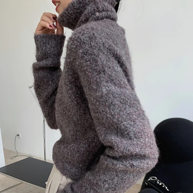 Autumn and winter women's sweater casual solid color high neck long sleeve loose sweater
Autumn and winter women's sweater casual solid color high neck long sleeve loose sweater