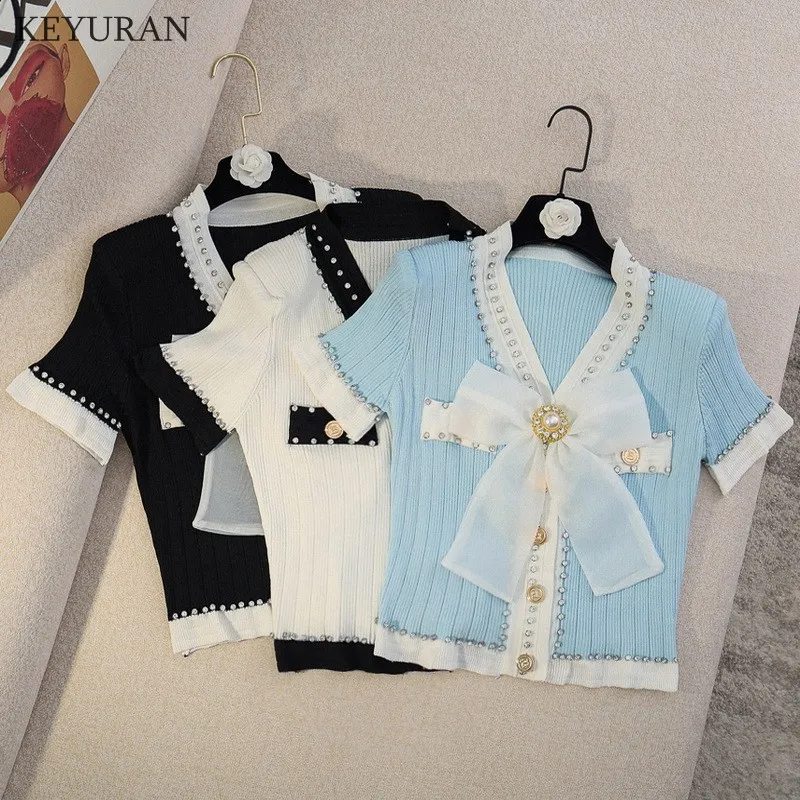 Женский трикотажный кардиган с бантом, однобортный вязаный укороченный топ с коротким рукавом и крупными бриллиантами в Корейском стиле на...
Женский трикотажный кардиган с бантом, однобортный вязаный укороченный топ с коротким рукавом и крупными бриллиантами в Корейском стиле на...