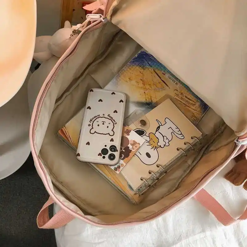 Mode contrast trend female bag color sealing nylon and anti-theft student rucksack 2021
Mode contrast trend female bag color sealing nylon and anti-theft student rucksack 2021