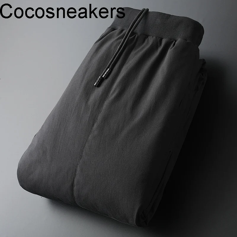 Town store cattle goods winter men's waterproof thickened warm white duck down slim fit legged down pants for men
Town store cattle goods winter men's waterproof thickened warm white duck down slim fit legged down pants for men