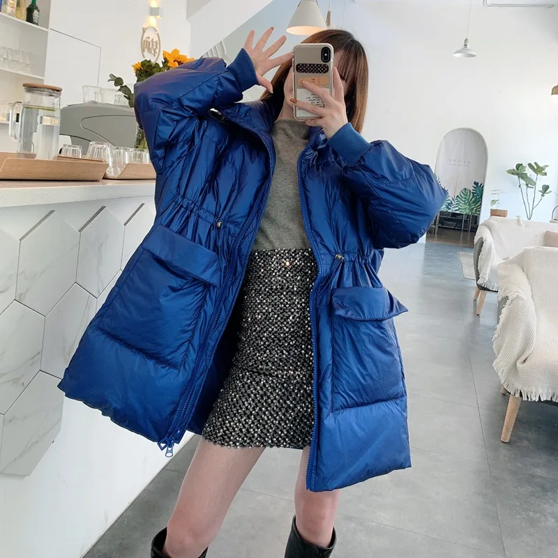 2020 autumn and winter bright face down jacket coat mid-length loose fashion thick coat white duck down waist coat female trend
2020 autumn and winter bright face down jacket coat mid-length loose fashion thick coat white duck down waist coat female trend
