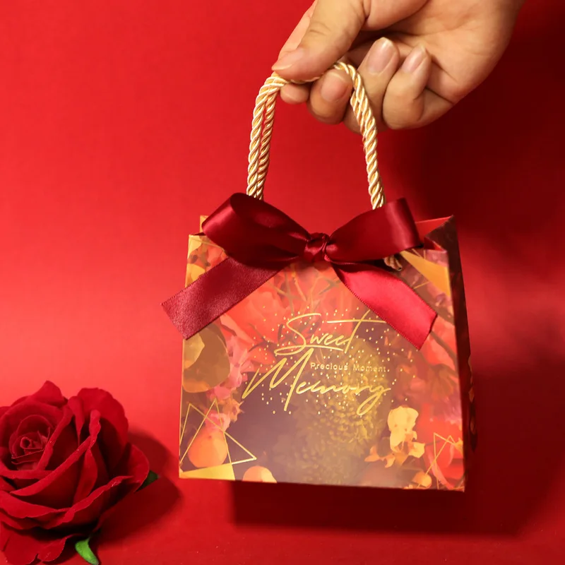 New Creative Bow Portable Gift Box Packaging Event & Party Supplies Bronzing Candy Box Baby Shower Paper Chocolate Boxes Package
New Creative Bow Portable Gift Box Packaging Event & Party Supplies Bronzing Candy Box Baby Shower Paper Chocolate Boxes Package
