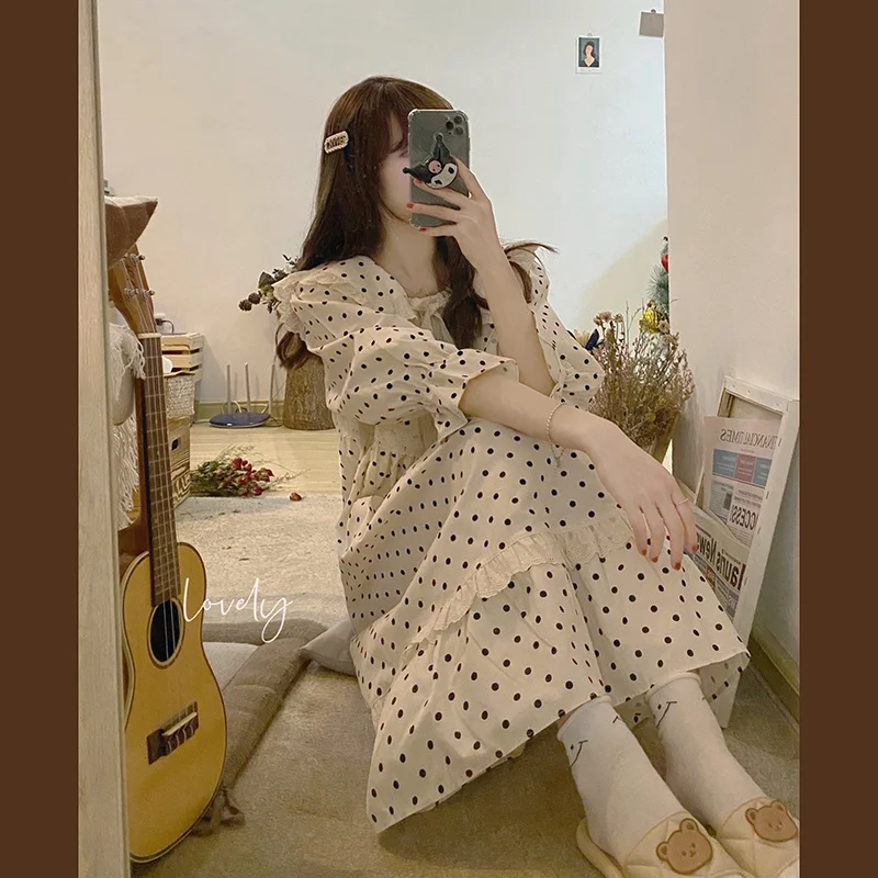 New Retro Polka Dot Long Skirt Lace-up Short-sleeved Dress Summer Temperament Korean Style Loose Mid-length Skirt Cute Style
New Retro Polka Dot Long Skirt Lace-up Short-sleeved Dress Summer Temperament Korean Style Loose Mid-length Skirt Cute Style