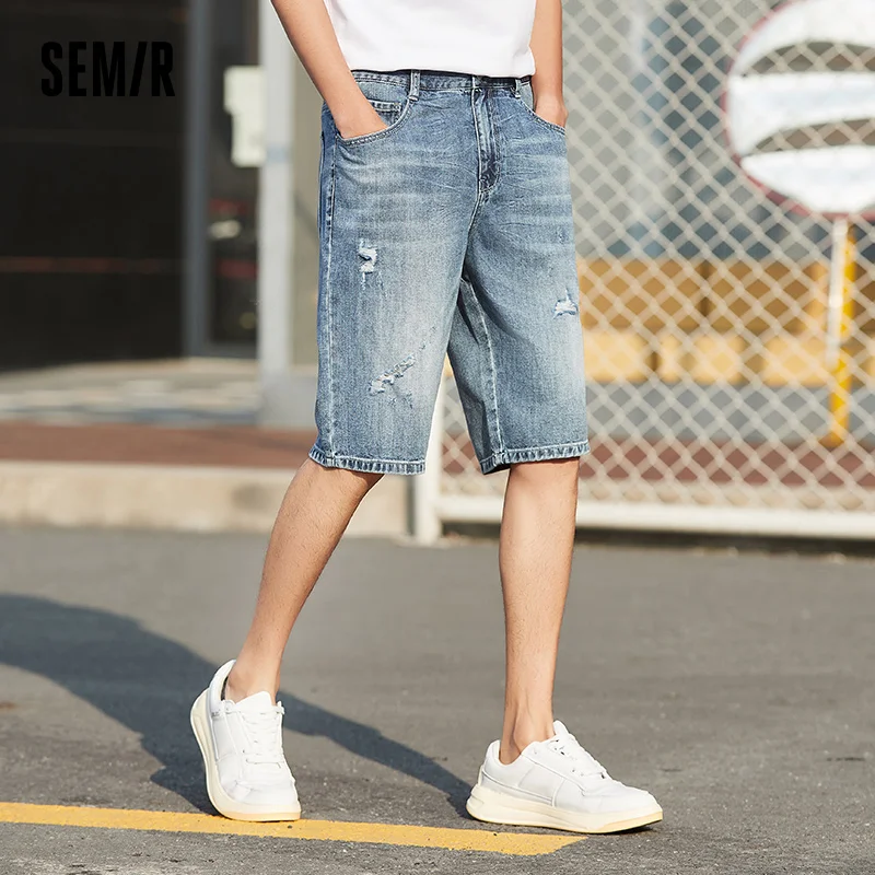 SEMIR Denim Shorts Men 2021 Summer Thin Section Ripped Jeans Loose Straight-Leg Pants Trendy Boys Fifth Point Short Pants Casual
SEMIR Denim Shorts Men 2021 Summer Thin Section Ripped Jeans Loose Straight-Leg Pants Trendy Boys Fifth Point Short Pants Casual