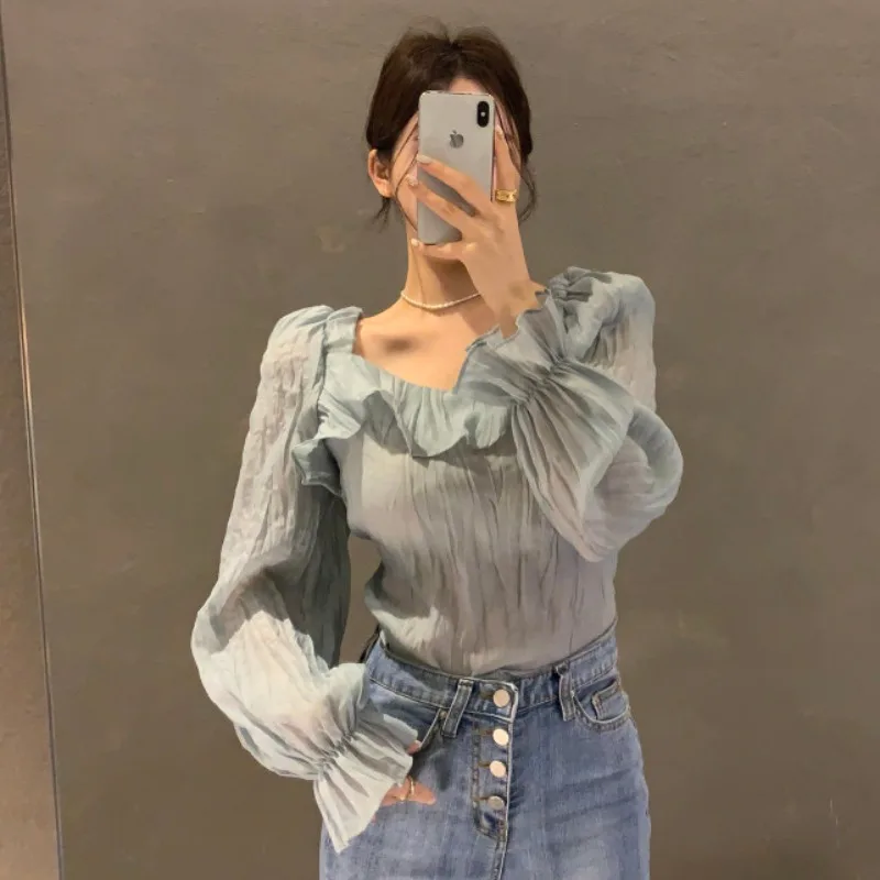 Korean Chic French Minority Retro Design Square Collar Wooden Ear Puff Sleeve Shirt Female Slimming Long Sleeve Top
Korean Chic French Minority Retro Design Square Collar Wooden Ear Puff Sleeve Shirt Female Slimming Long Sleeve Top
