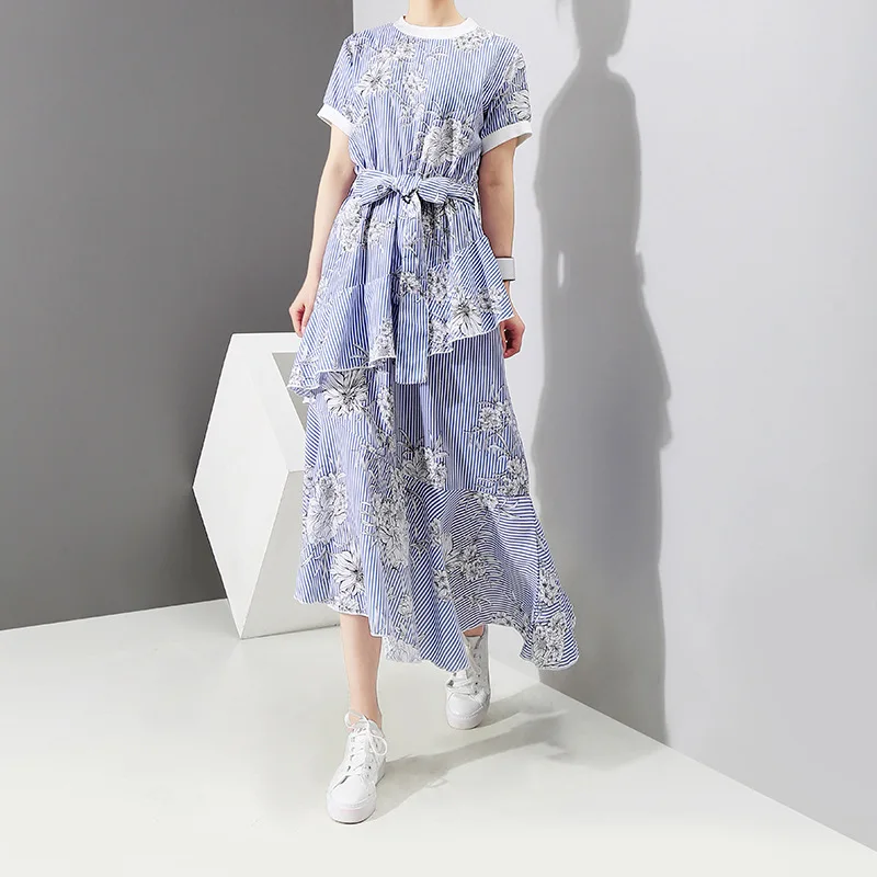 2021 Spring And Summer New Korean Women's Floral Dress Printing Waist Lace-Up Irregular Beach Skirt
2021 Spring And Summer New Korean Women's Floral Dress Printing Waist Lace-Up Irregular Beach Skirt