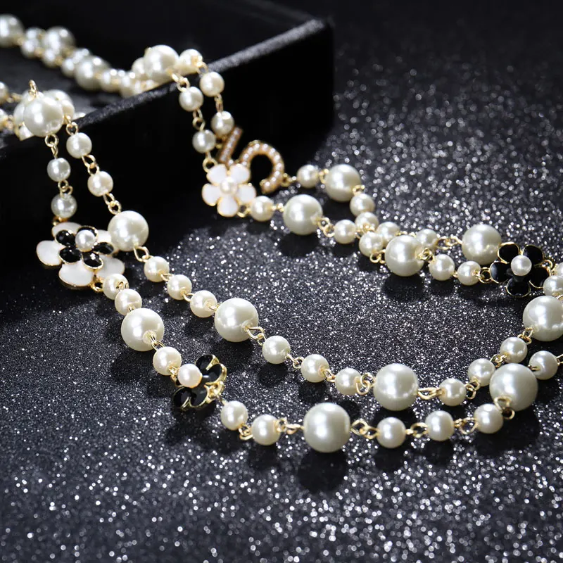 High Quality Women Long Pendants Layered Pearl Necklace Collares de moda Number 5 Flower Party Jewelry
High Quality Women Long Pendants Layered Pearl Necklace Collares de moda Number 5 Flower Party Jewelry