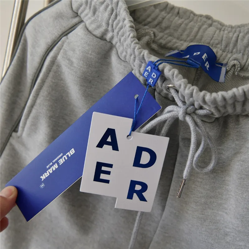 ADER ERROR Pants Men Women Reflective Side Strip Adererror Pants ADER Embroidered Sweatpants Trouser
ADER ERROR Pants Men Women Reflective Side Strip Adererror Pants ADER Embroidered Sweatpants Trouser