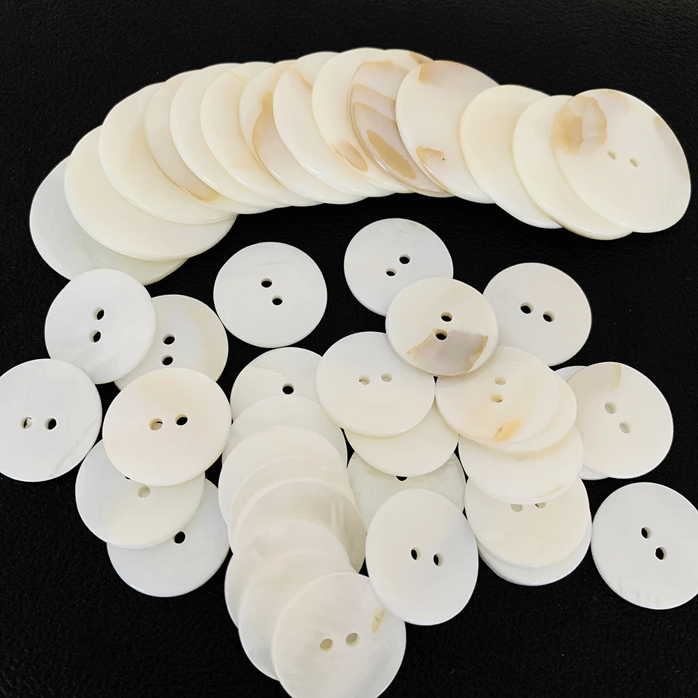 10PCS Natural Shell Sewing Buttons White Mother of Pearl MOP Round Shell 2 Hole Button Craft Clothing Sewing Accessories 20/30mm 
10PCS Natural Shell Sewing Buttons White Mother of Pearl MOP Round Shell 2 Hole Button Craft Clothing Sewing Accessories 20/30mm