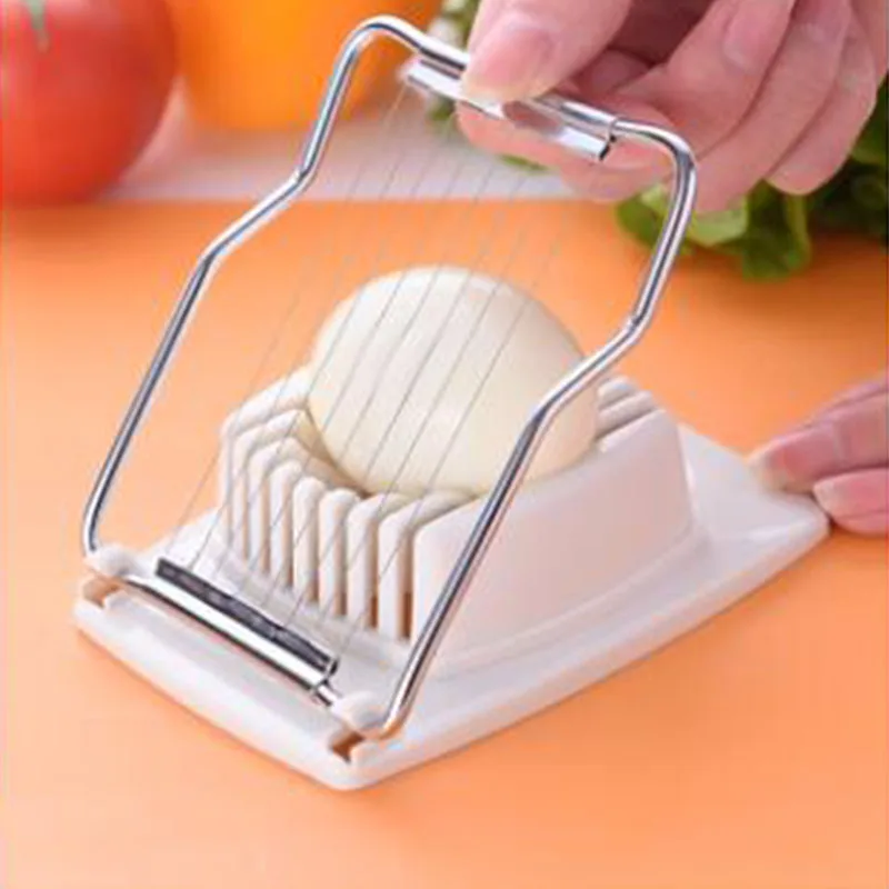 1Pcs Multifunction Kitchen Cut Egg Slicer Sectioner Cutter Mold Flower Edges New Egg Shaper Kitchen Accessories High Quality
1Pcs Multifunction Kitchen Cut Egg Slicer Sectioner Cutter Mold Flower Edges New Egg Shaper Kitchen Accessories High Quality