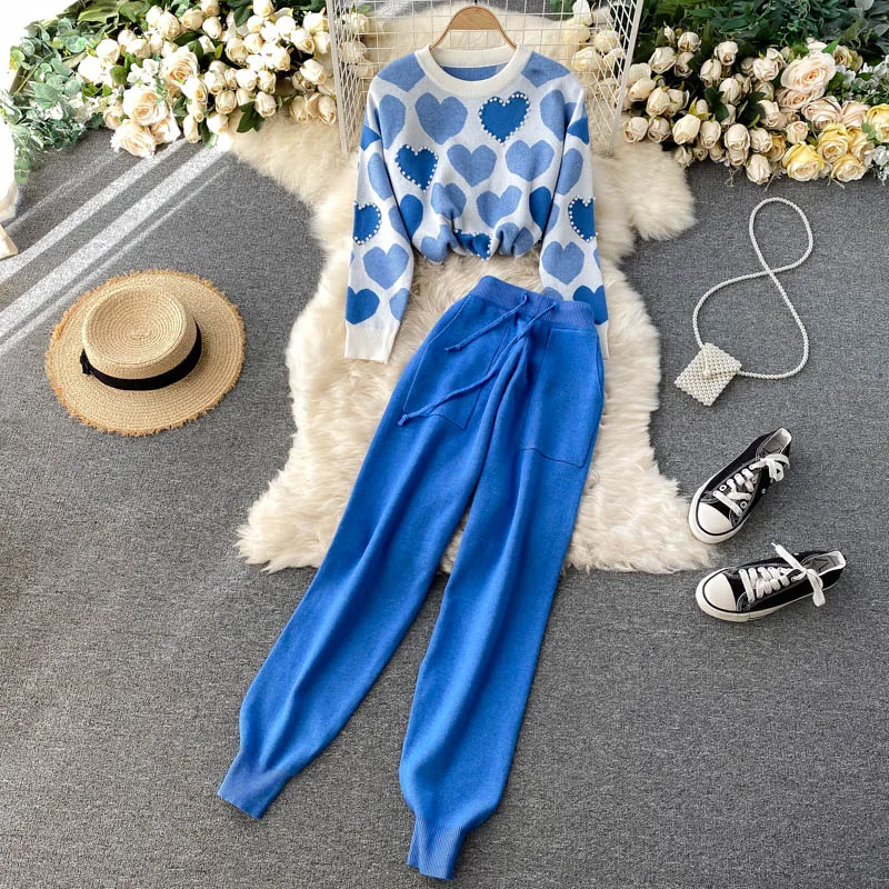 2021 Autumn and Winter New Ladies Heart-shaped Pattern Beaded Sweater Knitted Top + High-waist Wide-leg Pants
2021 Autumn and Winter New Ladies Heart-shaped Pattern Beaded Sweater Knitted Top + High-waist Wide-leg Pants