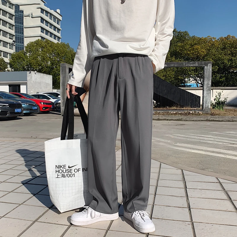 Solid Men Casual Pants Pleated Pockets Mens Fashion Clothing Mopping Hong Kong Style Zipper Fly Spring New Trousers Loose Bottom
Solid Men Casual Pants Pleated Pockets Mens Fashion Clothing Mopping Hong Kong Style Zipper Fly Spring New Trousers Loose Bottom